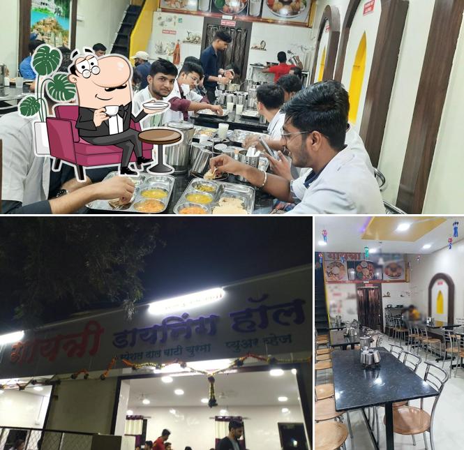 Take a seat at one of the tables at Gayatri Dining Hall