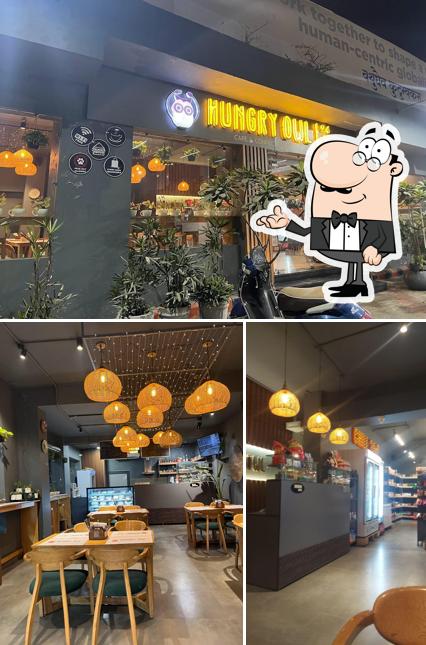The picture of Hungry Owl Cafe & Confectionery’s interior and exterior