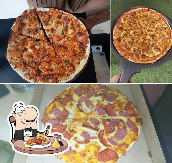 Pick pizza at Cafe South Cartel Goa