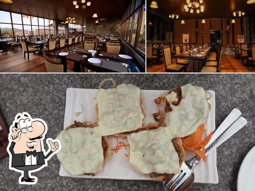 The photo of interior and food at Hotel Maharaja