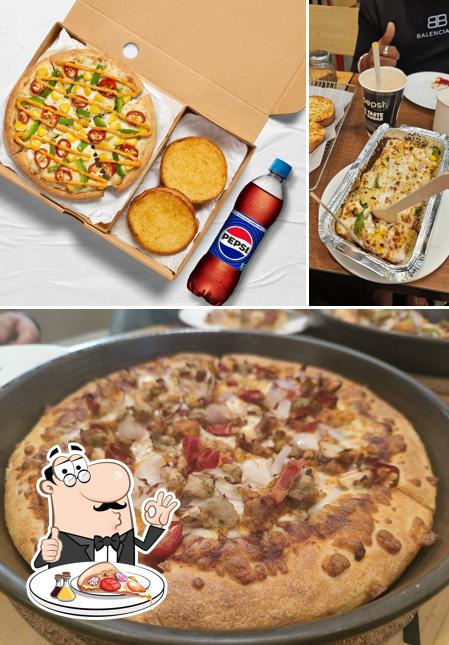 Get pizza at Pizza Hut Jogeshwari West, Mumbai