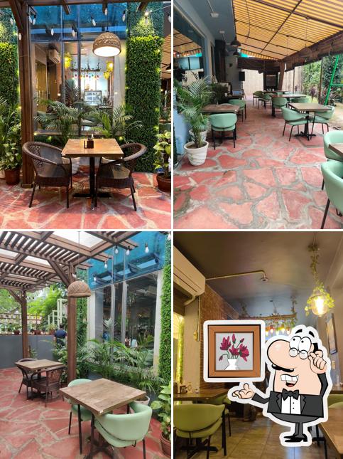 Take a seat at one of the tables at Woodrose Caffe