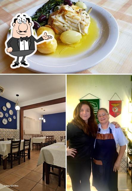 Esta é a foto mostrando interior e comida no Restaurante Brasinha - Família Simões