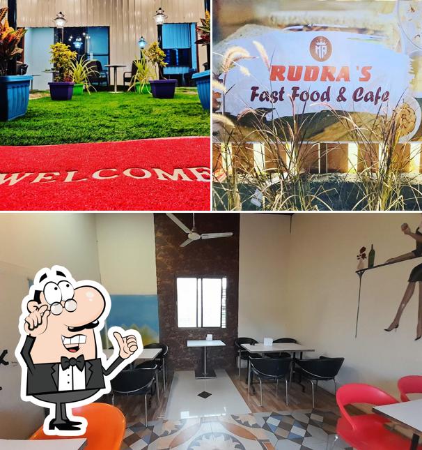 Take a seat at one of the tables at CAFE RUDRA'S - couple and families friendly cafe