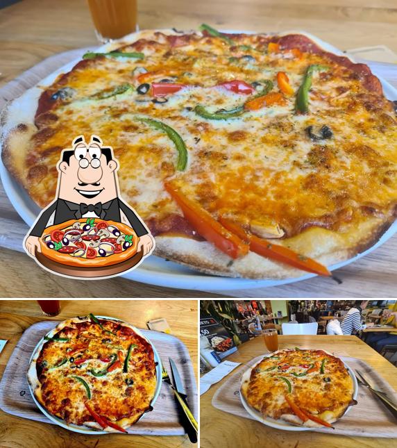 Ordina una pizza a Manora Restaurant Fribourg