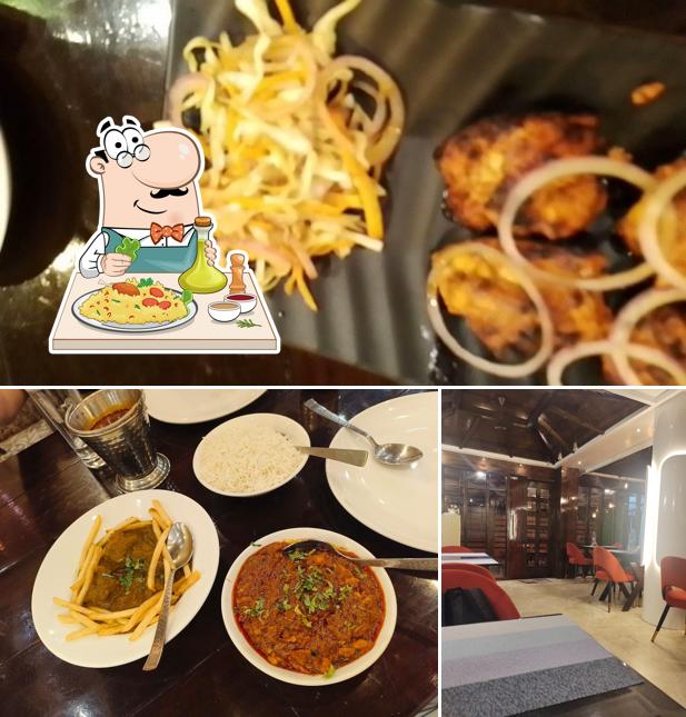 This is the photo depicting food and interior at Coastal Grills and Spices