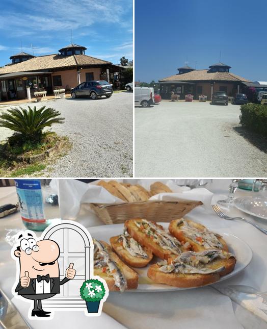 Questa è la foto che mostra la esterno e cibo di VanaVana
