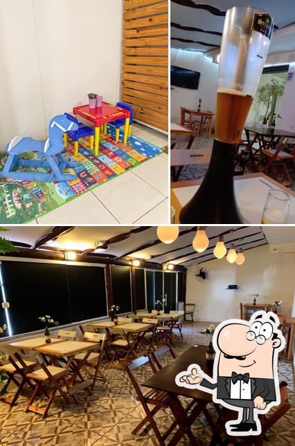 O interior do Pizzaria D'tonos - Pizzas À La Carte ou Tele Entrega