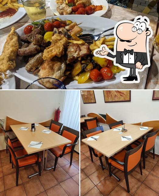 Questa è la foto che mostra la interni e cibo di Restavracija Zila