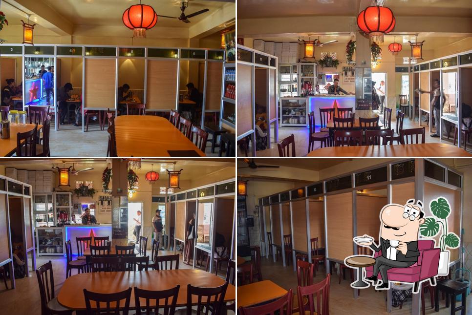 Take a seat at one of the tables at Blue Heaven Restaurant