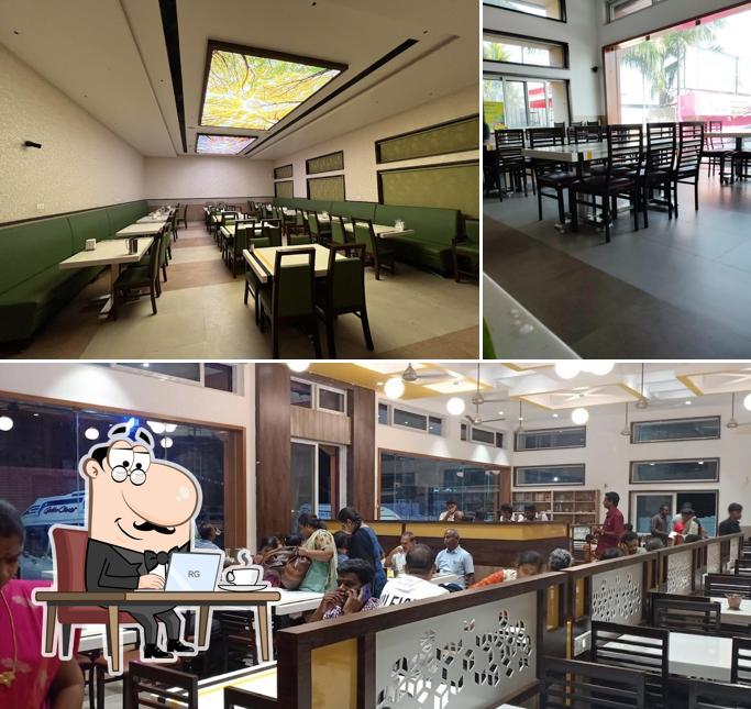 Take a seat at one of the tables at Sri Saravana Bhavan