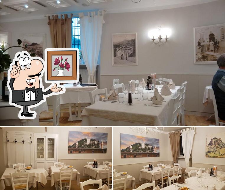 Dai un'occhiata agli interni di Trattoria Belvedere piatti tipici carne salada