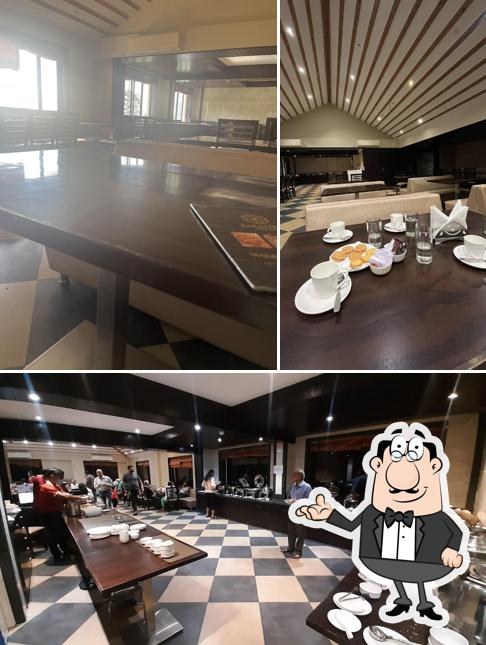 Take a seat at one of the tables at MADHUR