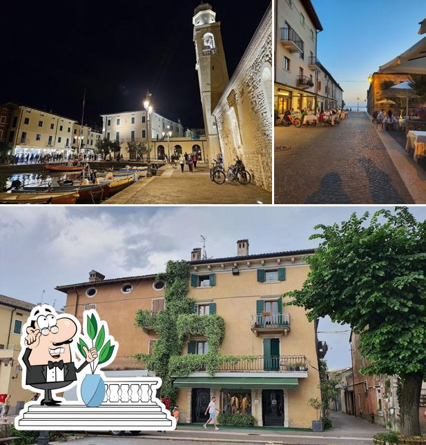 Curiosa tra l'area esterna di Vecchia Dogana Restaurant