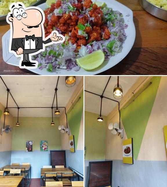 This is the photo depicting interior and food at Delight Kitchen Restaurant