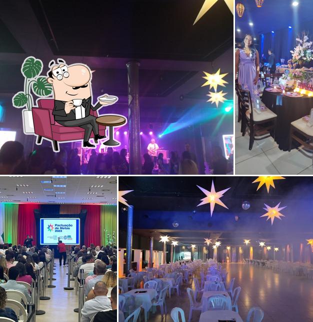 Sente em uma das mesas no ENGENHO APIPUCOS Recepções & Eventos