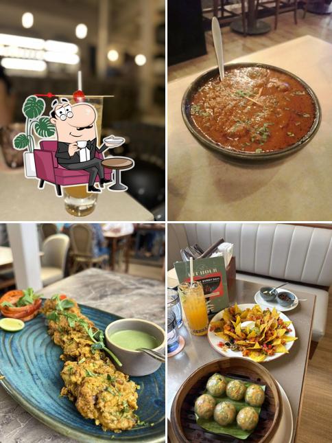 Take a seat at one of the tables at Orah Brew Garden