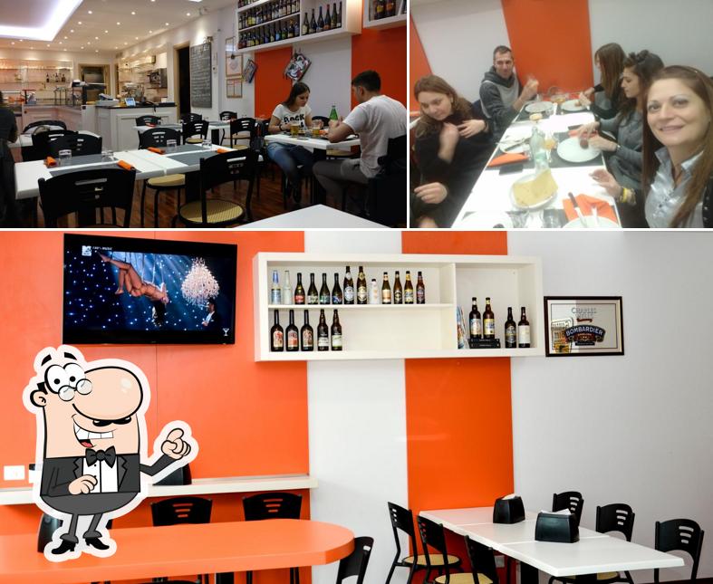 Guarda la immagine che mostra la interni e tavolo da pranzo di INFORNO Pizza & Bistrò