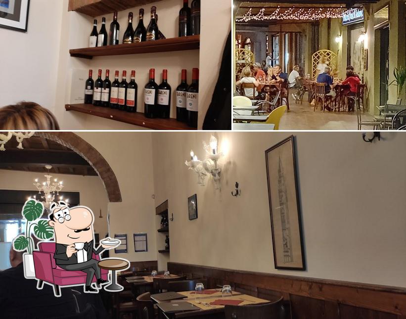 Dai un'occhiata agli interni di Osteria Pane e Salame
