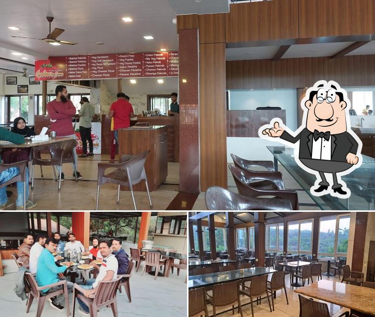 Take a seat at one of the tables at Garden Ice Cream Restaurant