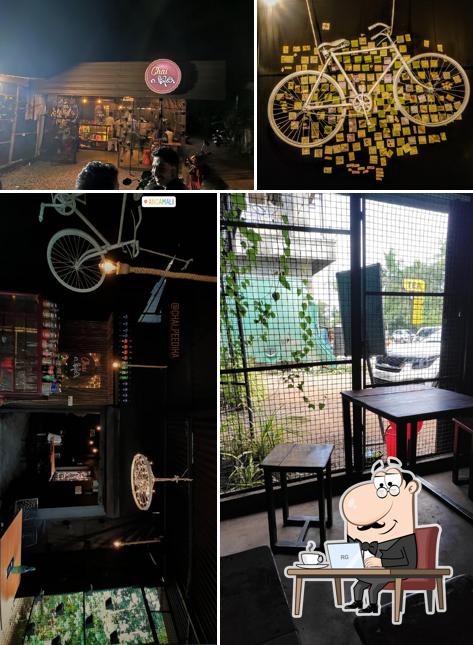 Take a seat at one of the tables at Chai Peedika Take a seat at one of the tables at Chai Peedika