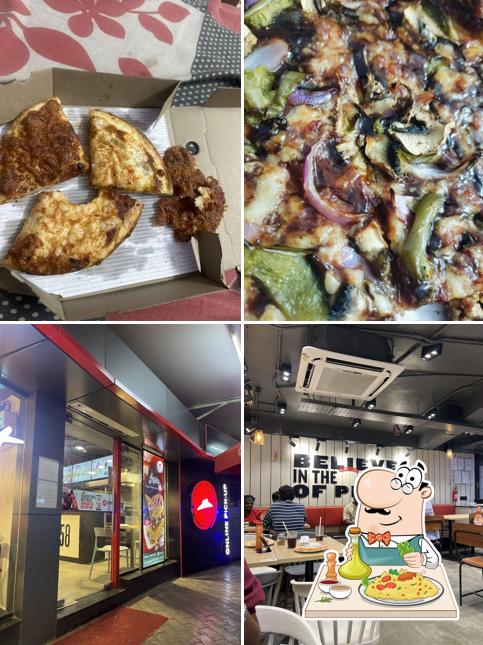 This is the picture showing food and interior at Pizza Hut Alandur, Chennai