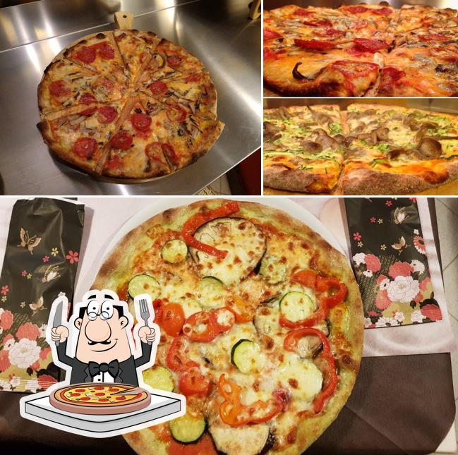 Prenditi una pizza a Risto Pizza Inn di Sefa Besnik