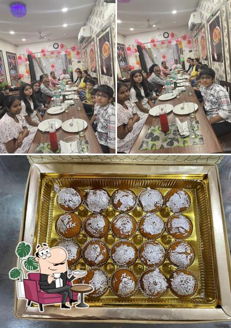 Take a look at the picture displaying interior and food at Ravi bakery &lovely sweets&restaurant