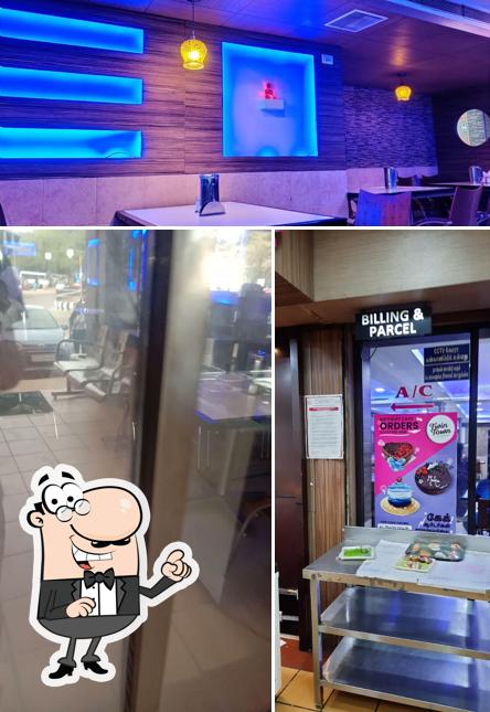 Take a seat at one of the tables at Nellai Saravana Bhava