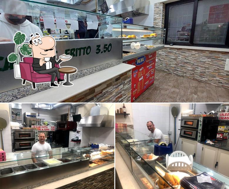 Dai un'occhiata agli interni di Pizzeria Mr Biin