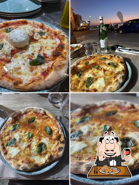 Prenditi una pizza a La Chiglia ristorante