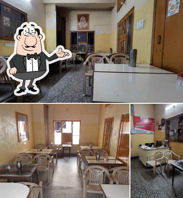 Take a seat at one of the tables at Mahaveer Bhojnalaya