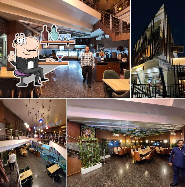 Take a seat at one of the tables at KC BAHU ROPEWAY RESTAURANT