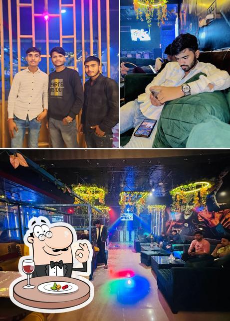 Check out the picture displaying food and interior at Diamond shisha cafe