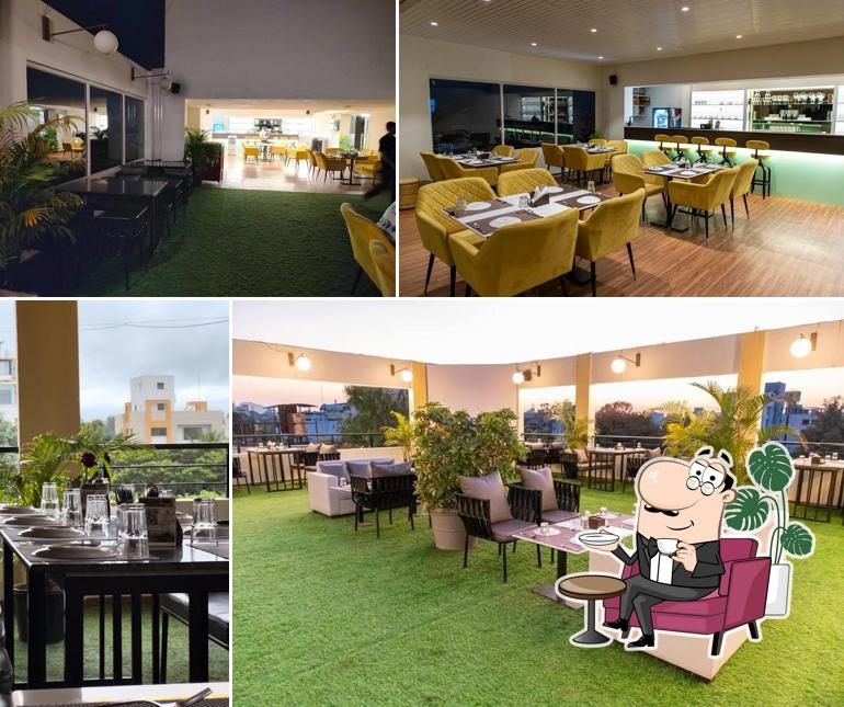 Take a seat at one of the tables at La Terraza The Cafe Bar