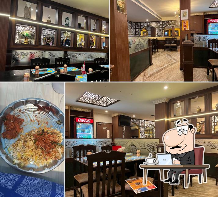 Take a seat at one of the tables at Rasavid Multi Cuisine Restaurant Thoraipakkam Chennai