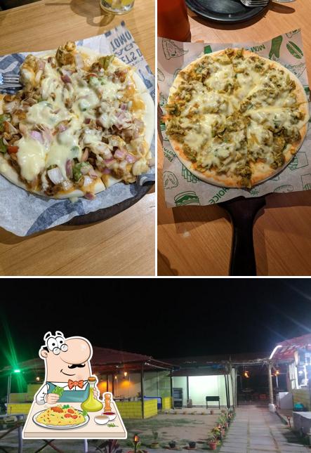 Take a look at the photo showing food and interior at K R Cafe