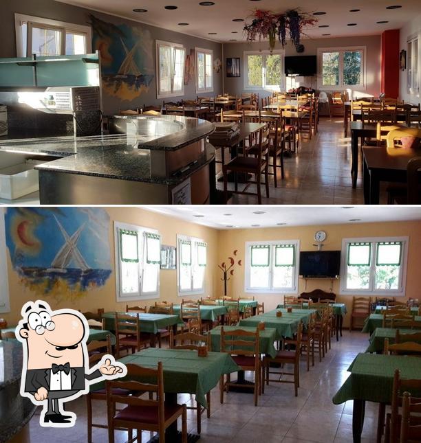 Dai un'occhiata agli interni di Pizzeria Luna Rossa-Carnia