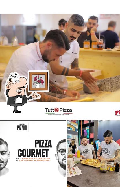 Tra le diverse cose da Pizzeria Guarracino si possono trovare la interni e bevanda