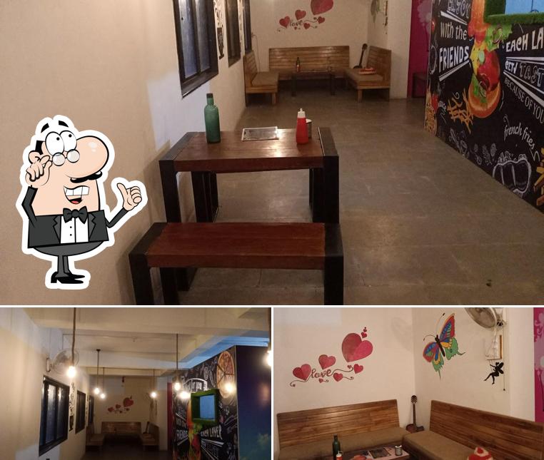 Take a seat at one of the tables at Cafe Cotton City