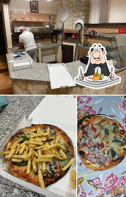 Pizzeria La Carrettiera si caratterizza per la cibo e interni