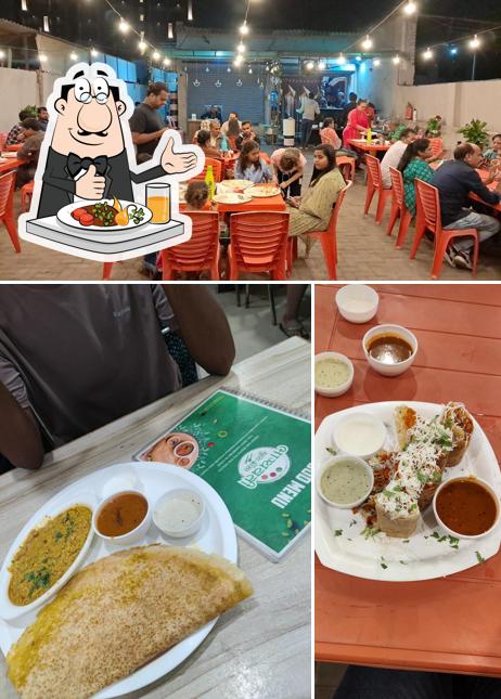 Take a look at the photo displaying food and interior at Bhagyawati Chula Dosa-Isanpur