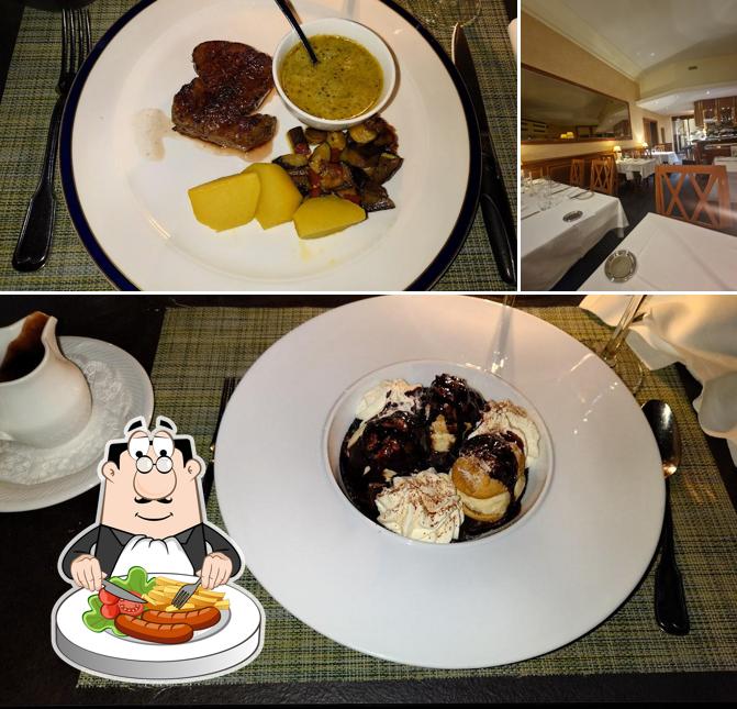 Questa è la foto che presenta la cibo e tavolo da pranzo di Mirabeau Restaurant