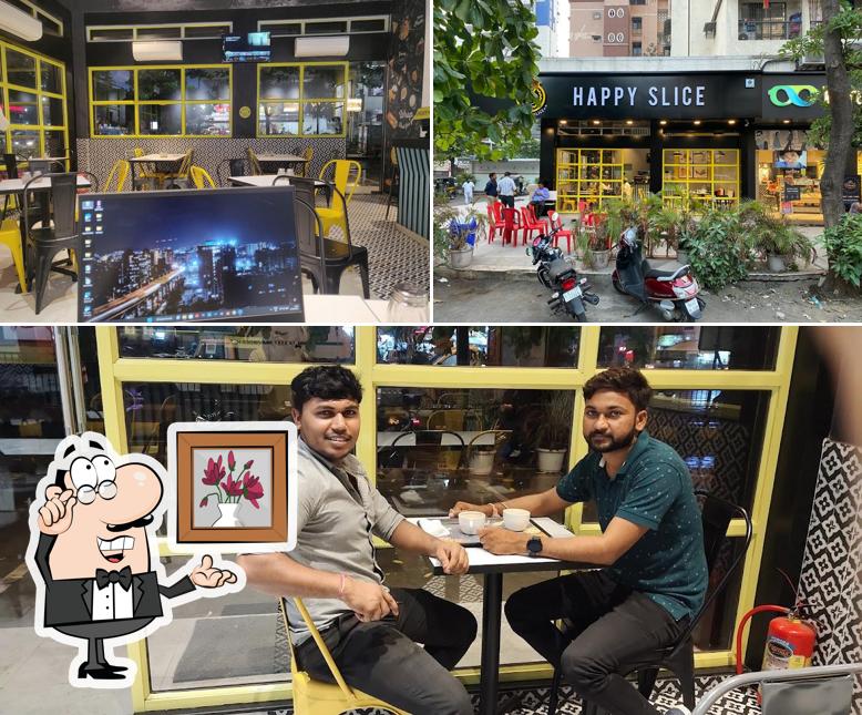 Take a seat at one of the tables at Happy Slice koparkhairane