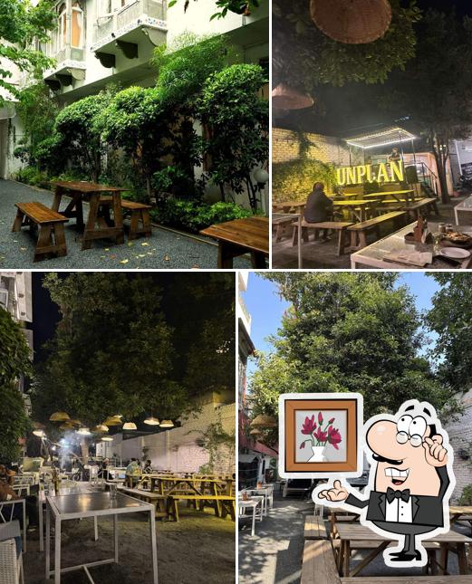 Take a seat at one of the tables at Unplan - by the lake