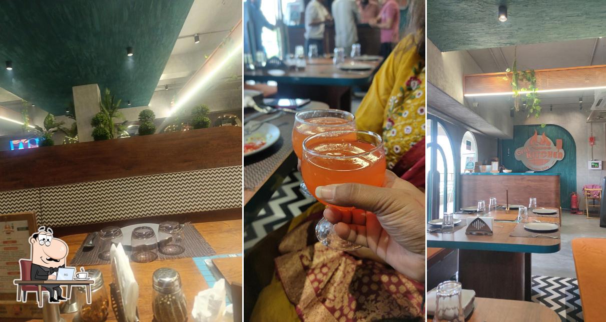 Take a seat at one of the tables at GRILL KITCHEN PRAHLADNAGAR