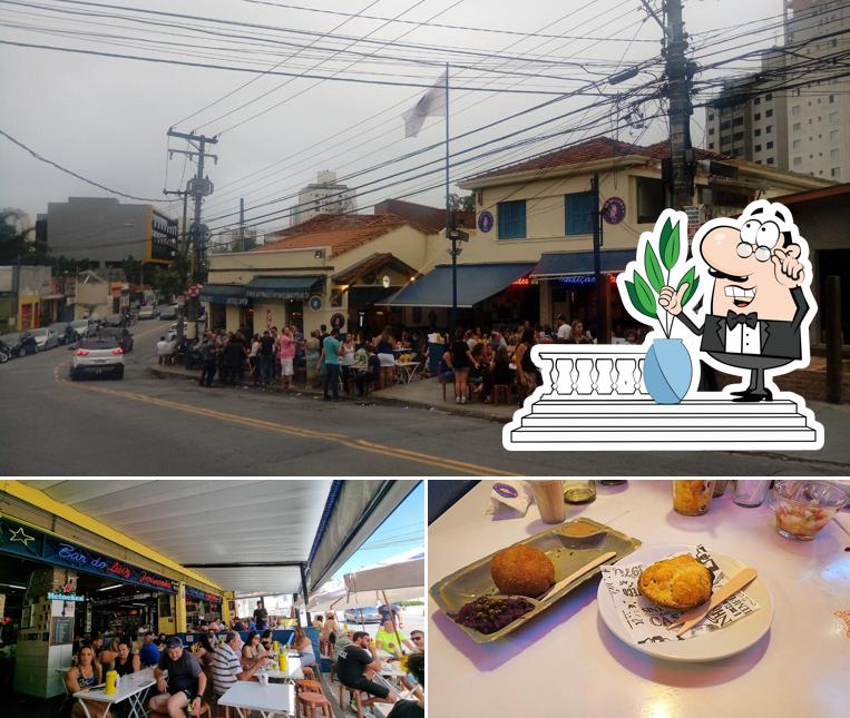 A imagem da exterior e comida no Bar do Luiz Fernandes