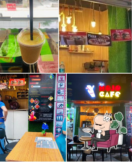 Take a look at the image showing interior and drink at The Mojo Cafe