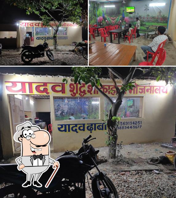 Among various things one can find exterior and interior at Yadav Dhaba यादव ढाबा (शुद्ध शाकाहारी भोजनालय)