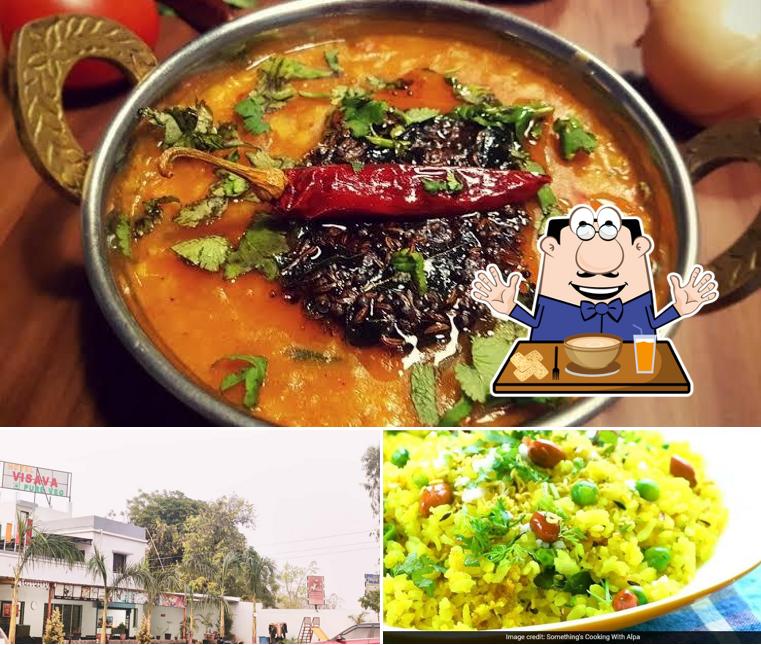 The picture of VISAVA PURE VEG FAMILY RESTAURANT & LODGING’s food and exterior